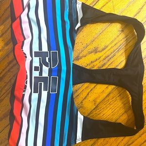P.E Nation Sports Bra is M. Leggings in different post size S